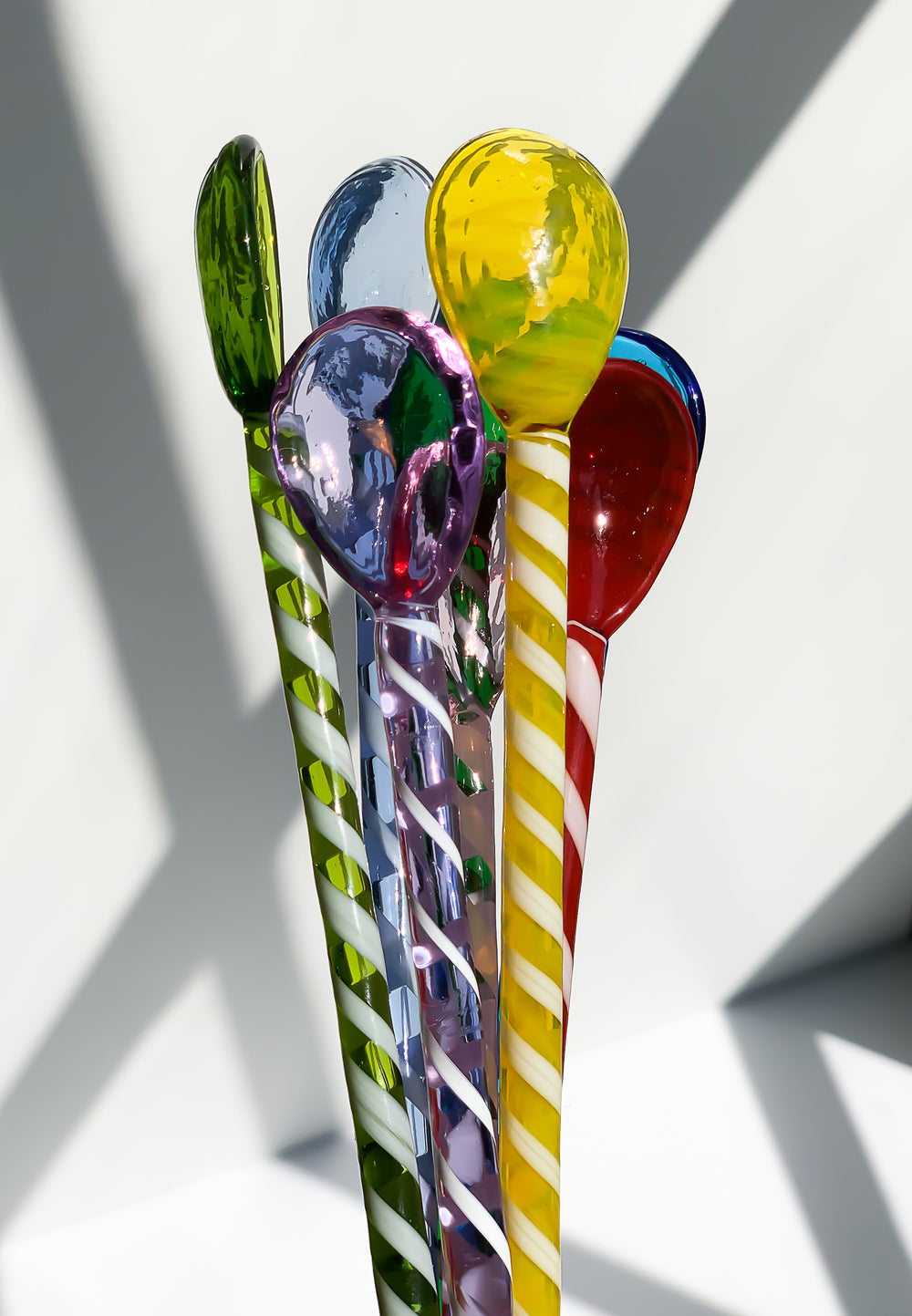 Full range of glass stirrers and spoons in twelve colours
