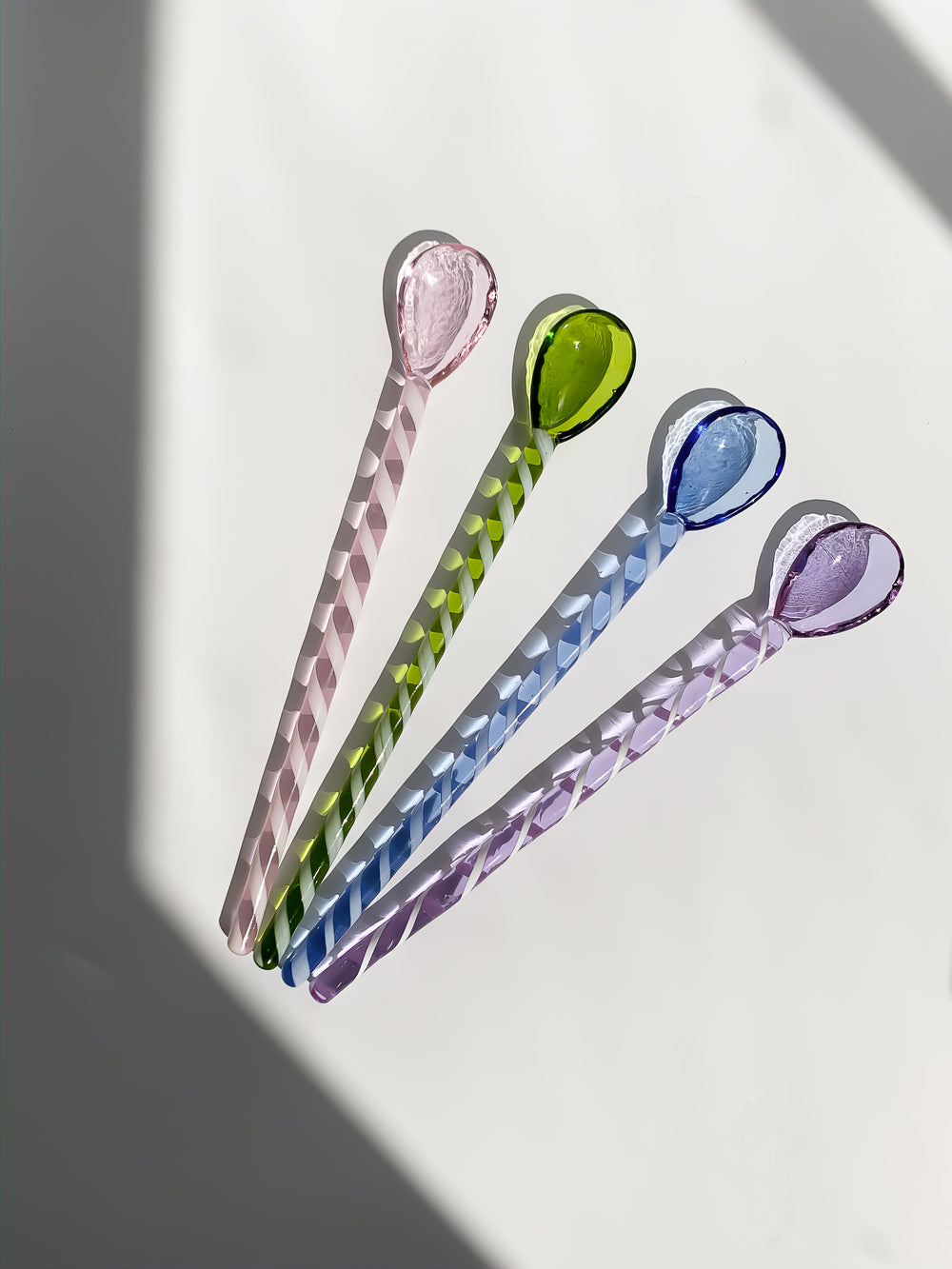 Glass stirrers and spoons in pink, mint, light blue and violet