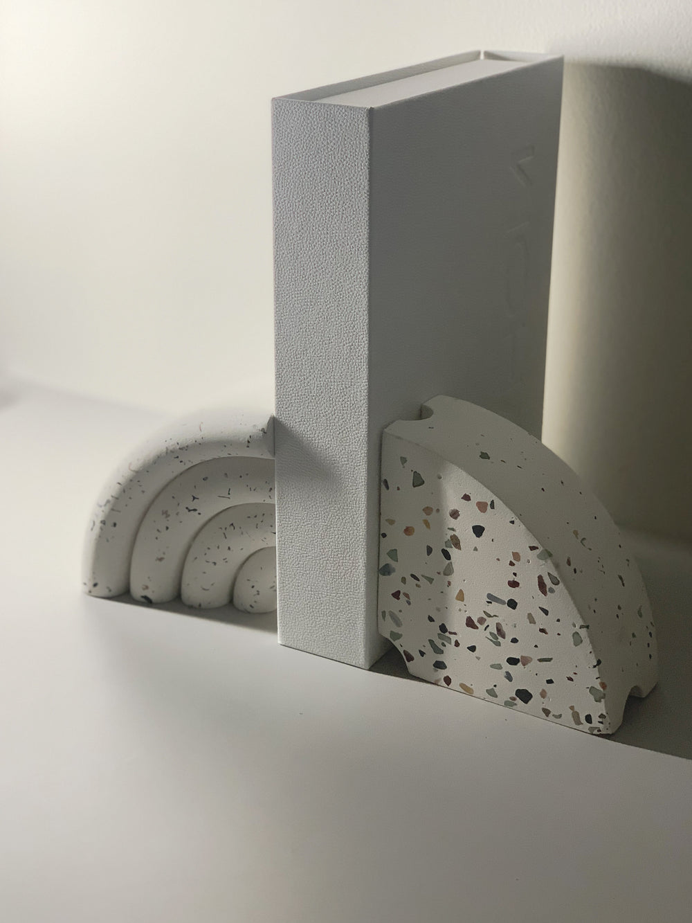 Bokstotto terrazzo bookends, close detail of the terrazzo surface