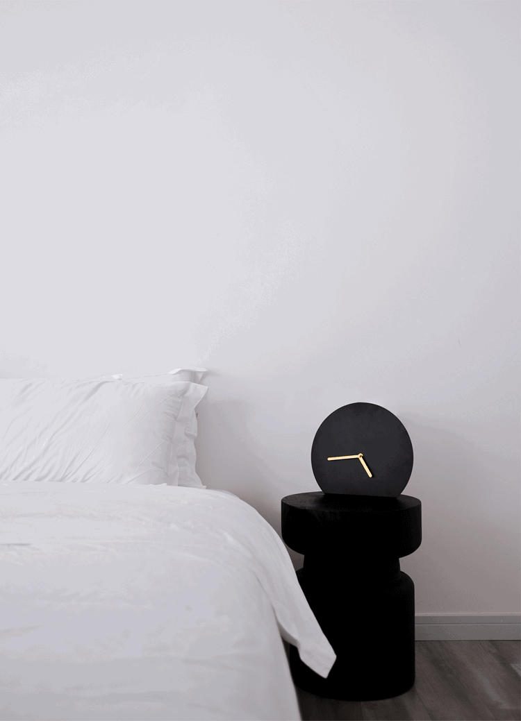 Minimalist standing clock in matt black