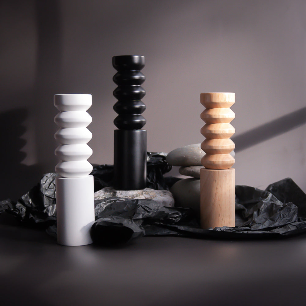 Salt and pepper grinders shown in natural oak, white and black